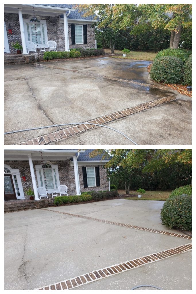 Concrete driveway with inlayed bricks cleaned with pressure